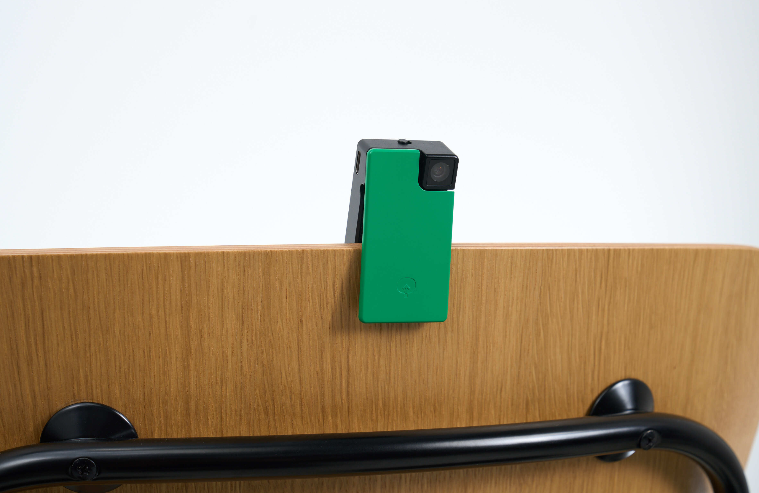 Saveclip attached to a chair backrest