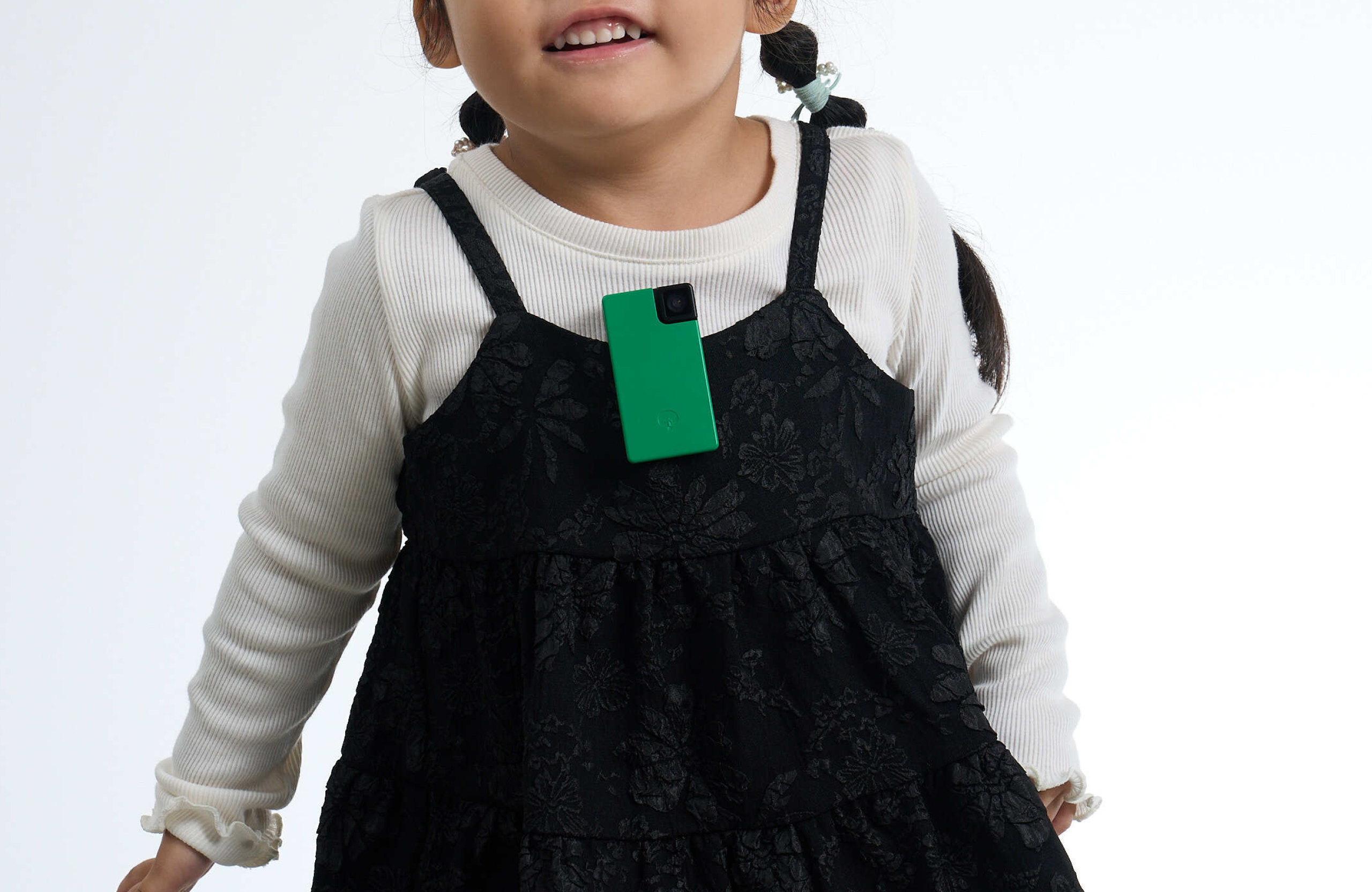 Child wearing Saveclip near the neck